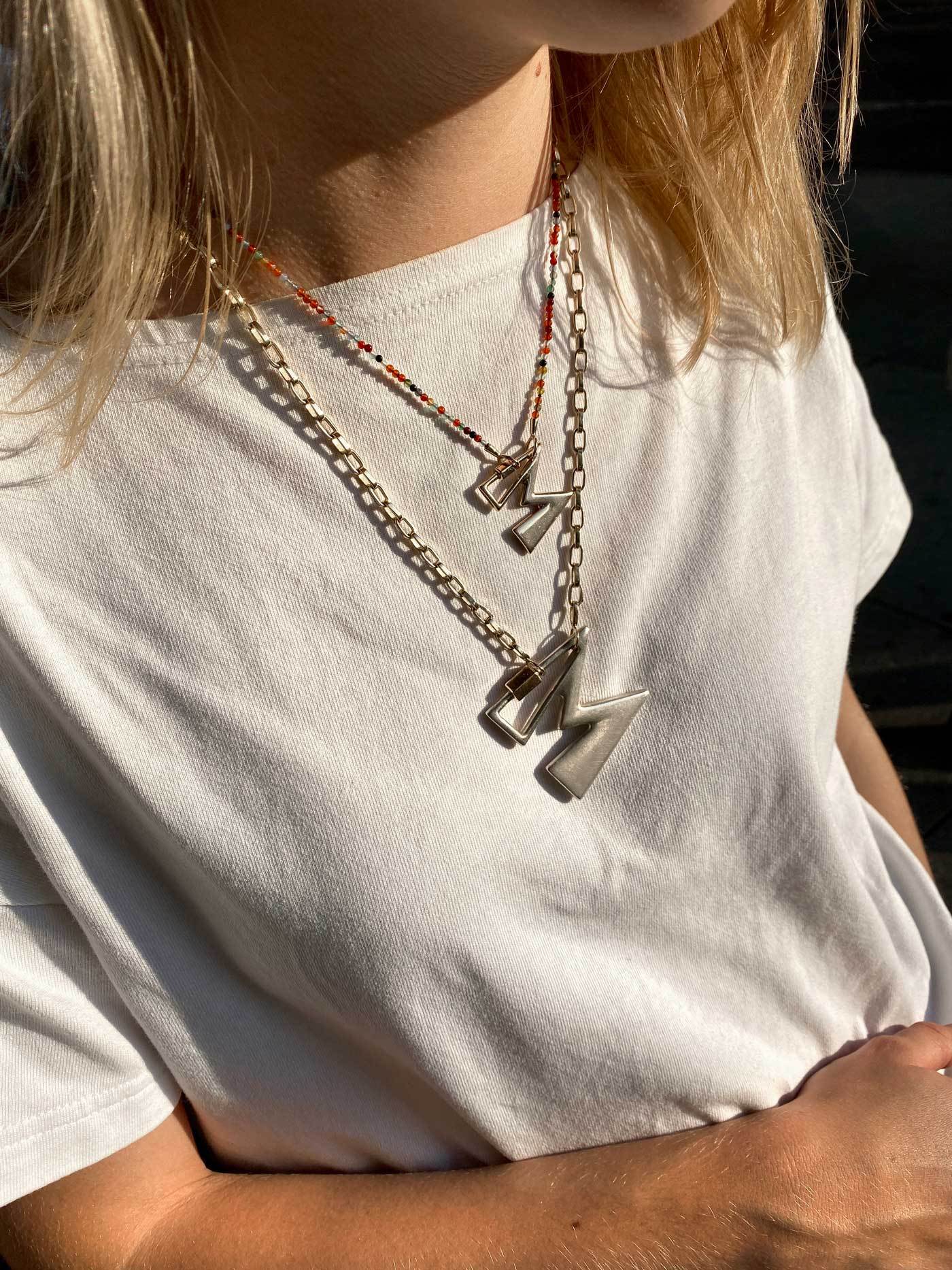 Small M gold